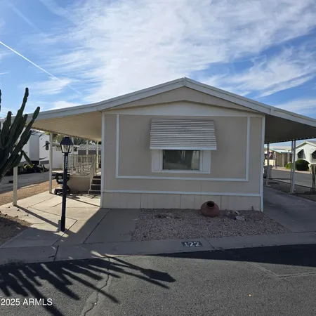 a childrens park with lots of swings and slides