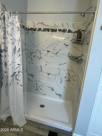 a backyard of a house with barbeque oven fire pit and outdoor seating