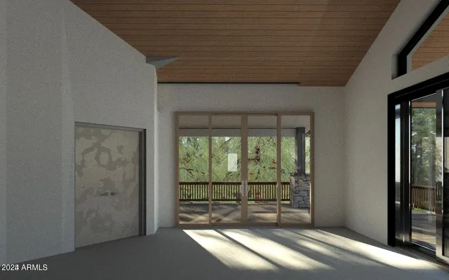 a view of a room with a large window