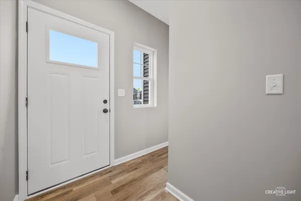 a view of small space with wooden floor