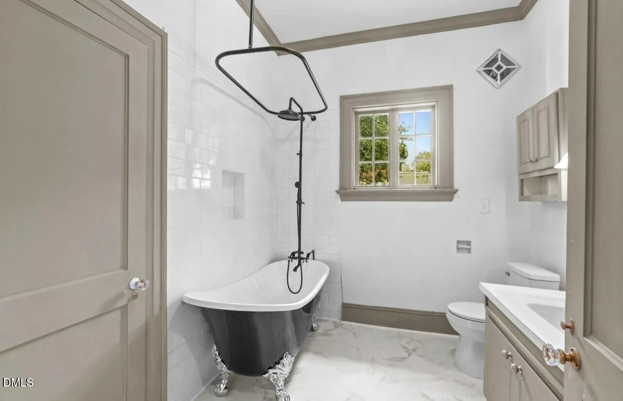 620 Falls Road Rocky Mount, NC 27804 - Photo 5 of 13 a bathroom with a sink a toilet and shower