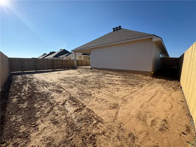 a front view of house with yard