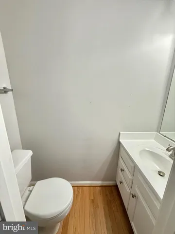 a bathroom with a sink toilet and vanity