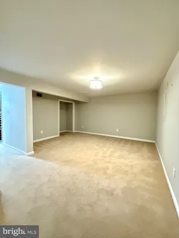 an empty room with a natural light