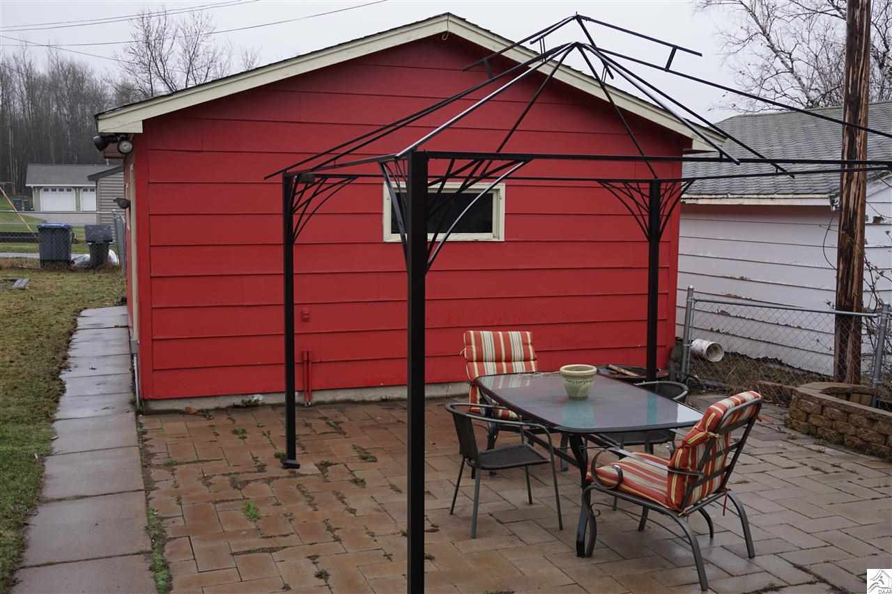 215 7th Street Proctor, MN 55810 - Photo 3 of 14 1+ Car Garage and a patio for BBQ's