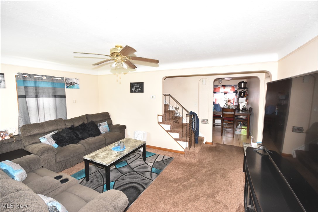 5840 Turney Road Cleveland, OH 44125 - Photo 3 of 21 Living room featuring carpet and ceiling fan