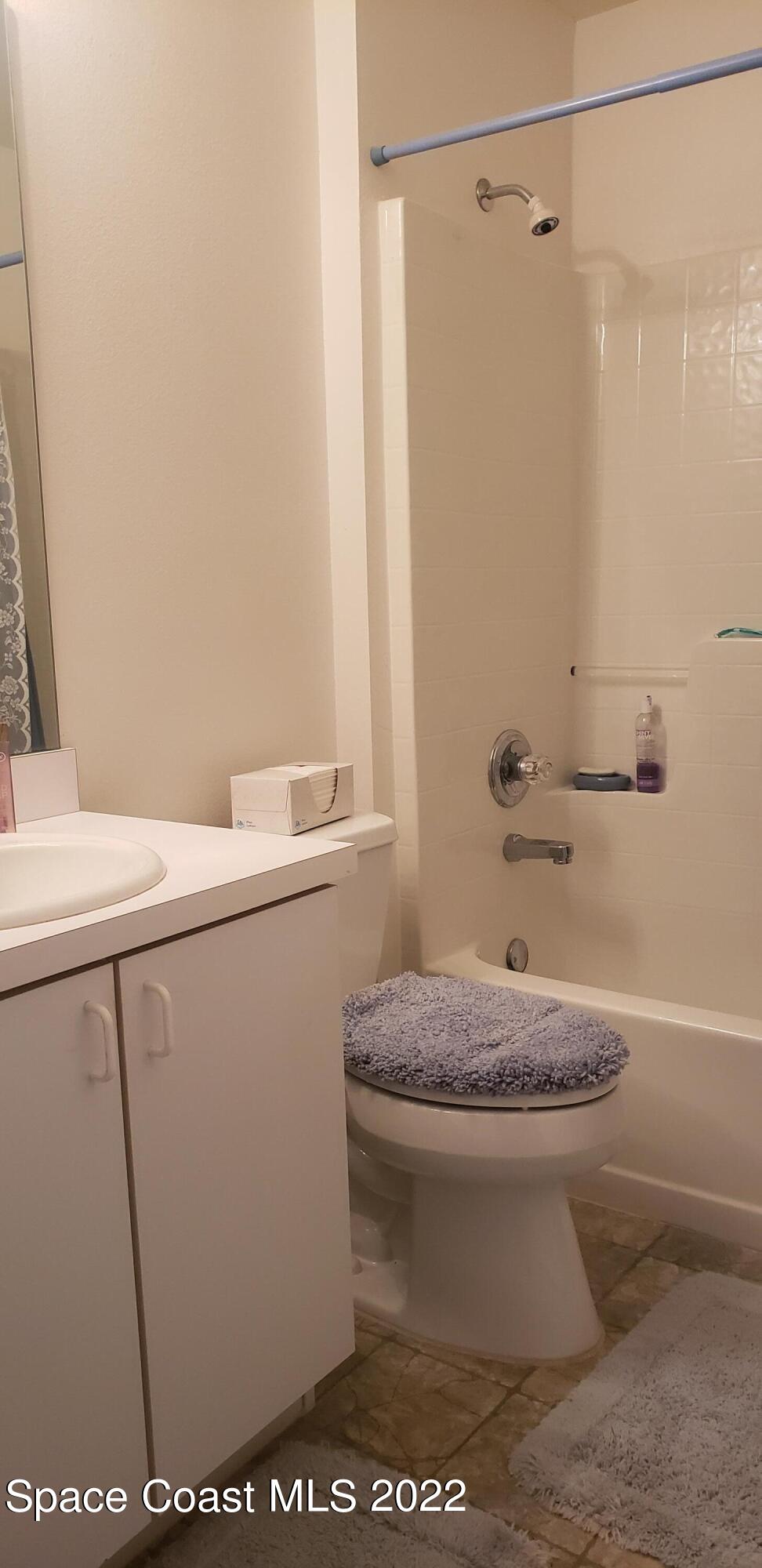 1260 Daton Road Southwest Palm Bay, FL 32908 - Photo 14 of 17 a bathroom with a toilet and a shower