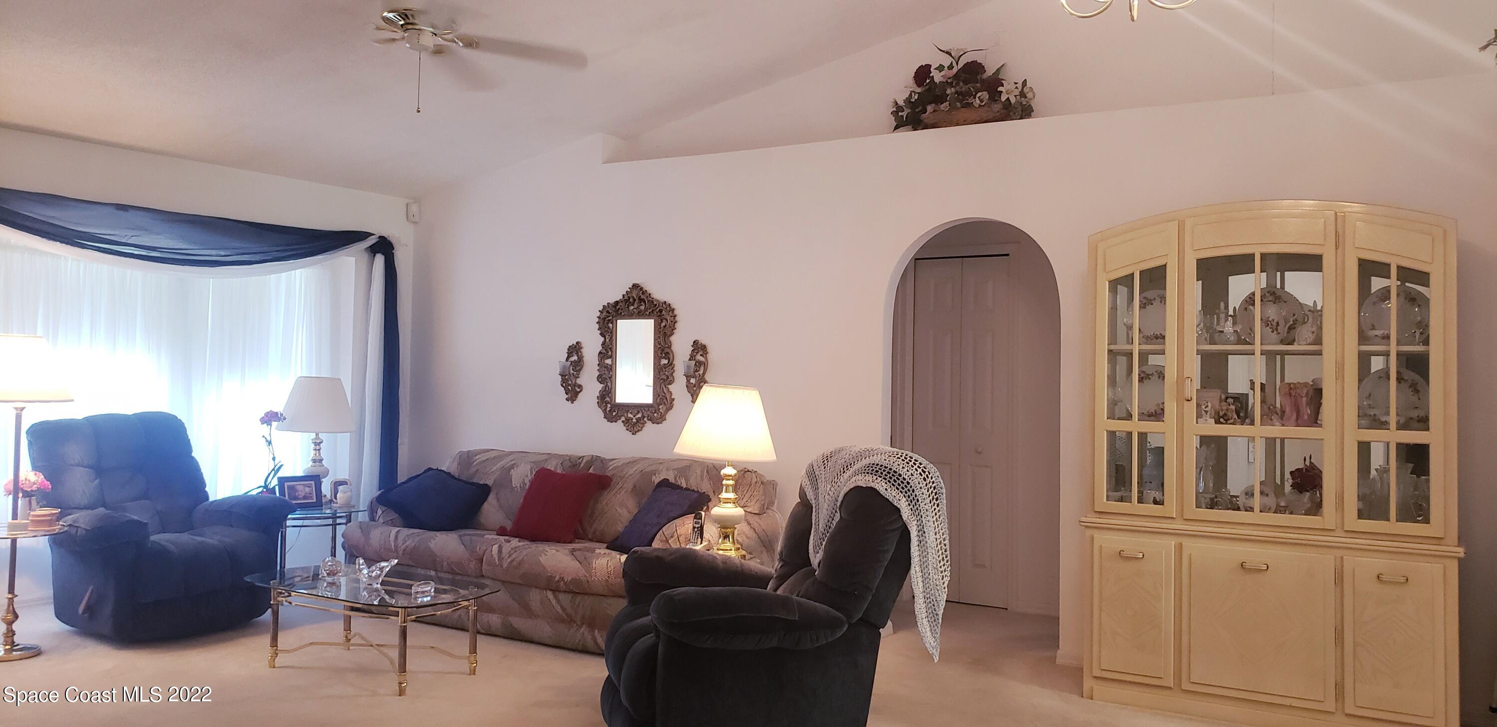 1260 Daton Road Southwest Palm Bay, FL 32908 - Photo 7 of 17 a living room with furniture