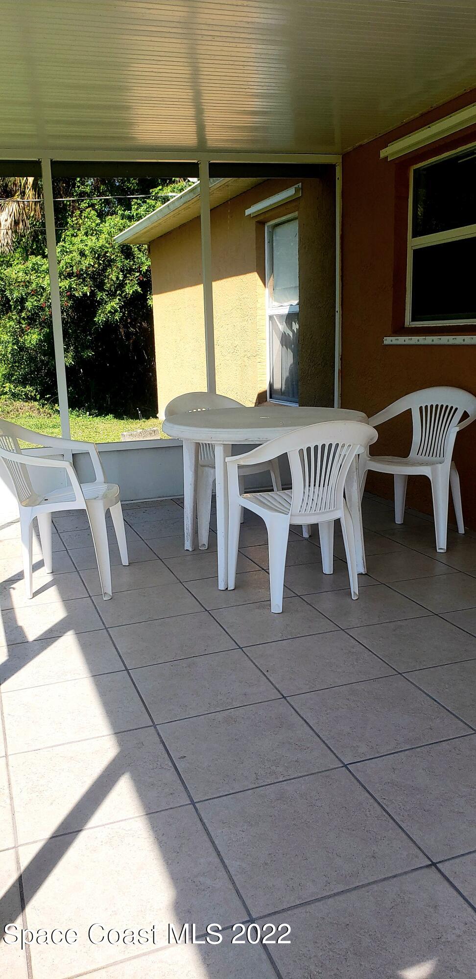 1260 Daton Road Southwest Palm Bay, FL 32908 - Photo 8 of 17 a view of balcony with furniture