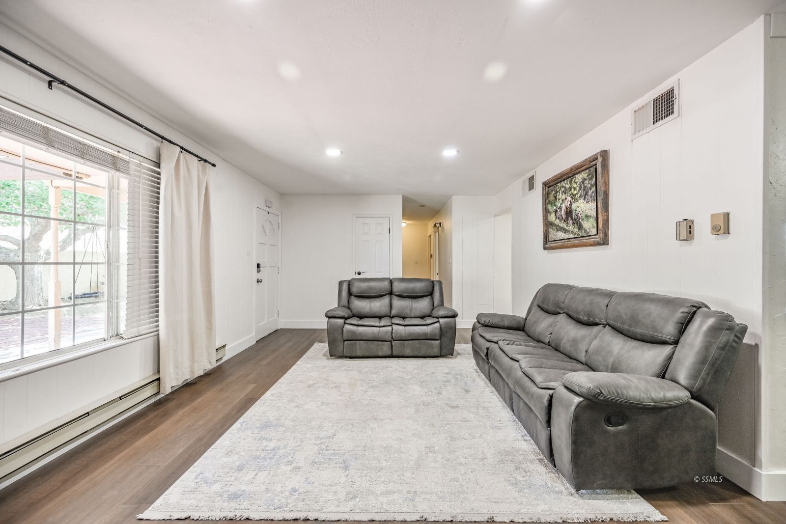 1407 North Indian Wells Street Ridgecrest, CA 93555 - Photo 15 of 50 a living room with furniture and a large window
