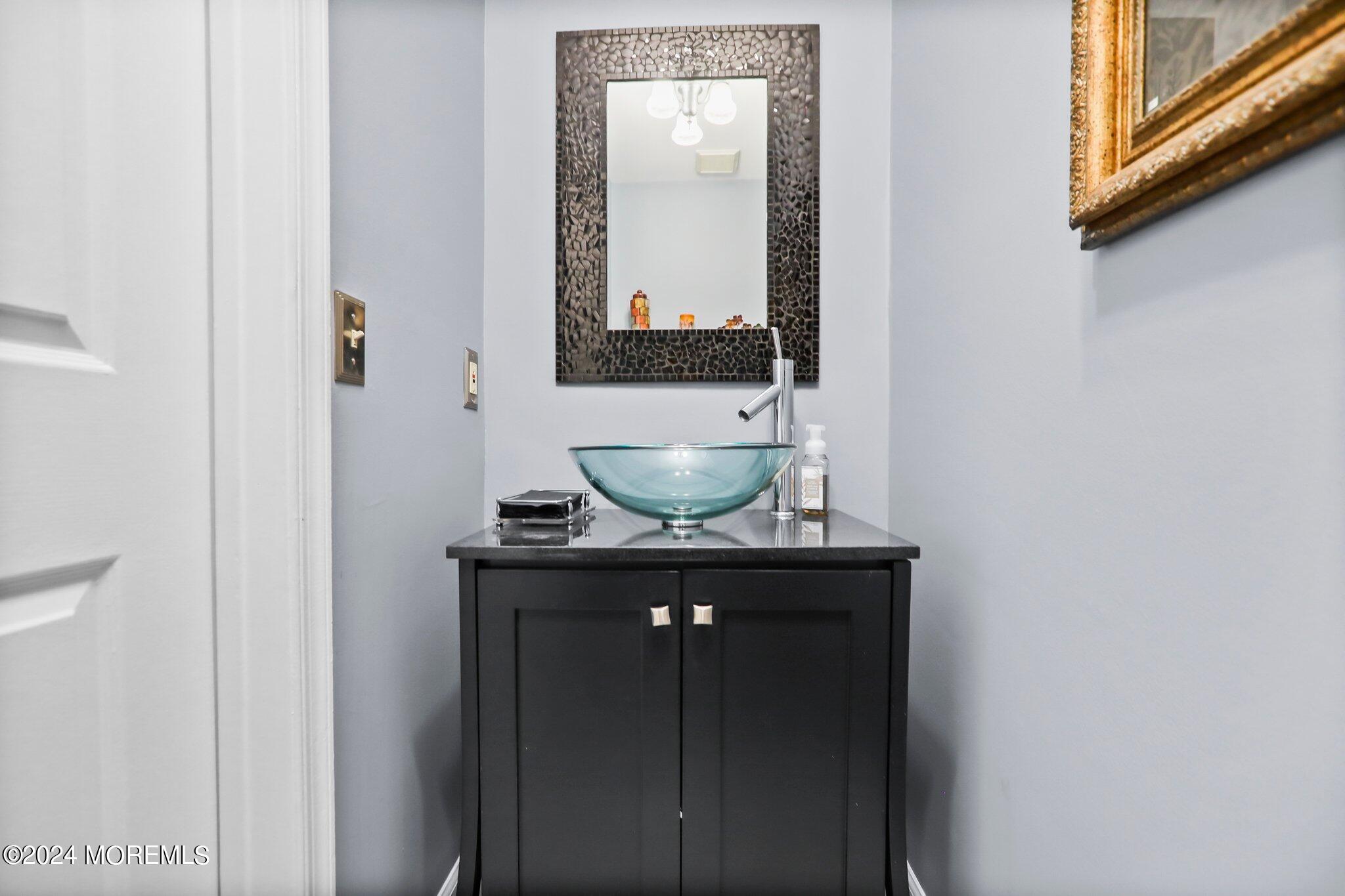 24 Apache Drive Manalapan, NJ 07726 - Photo 12 of 25 POWDER ROOM