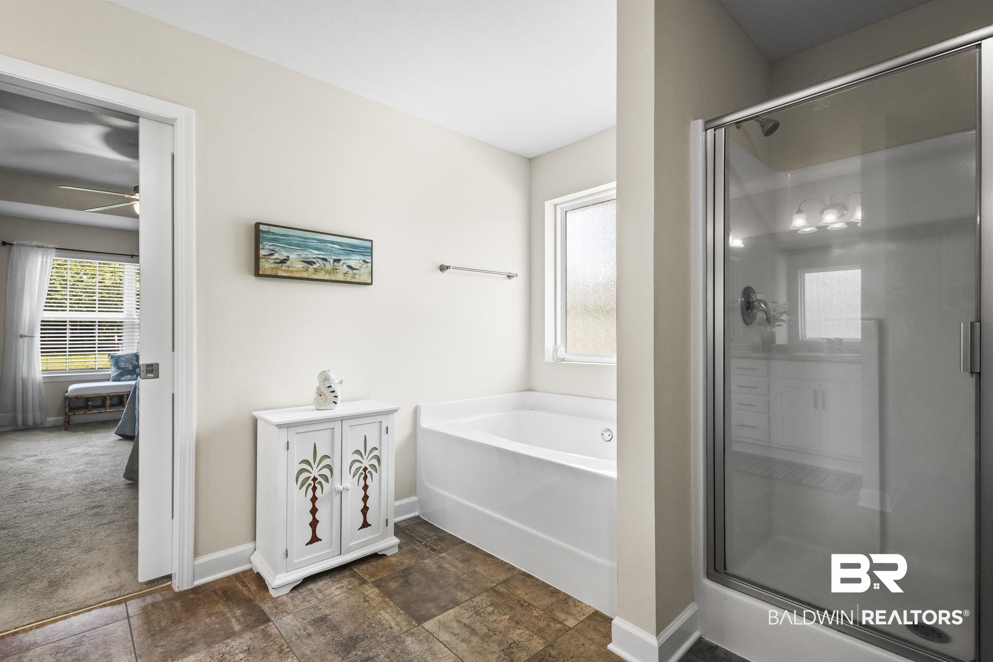 10473 Lyttleton Loop Lillian, AL 36549 - Photo 26 of 57 Bathroom with a shower stall, a garden tub, and ceiling fan