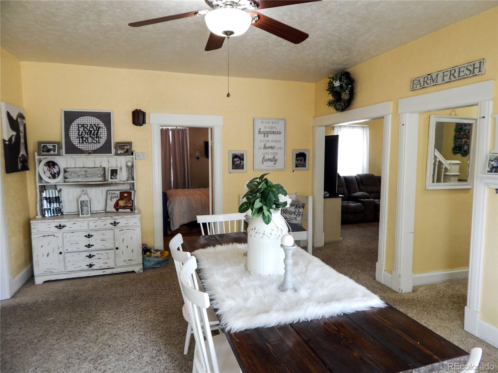 910 South Main Street Lamar, CO 81052 - Photo 13 of 37 a view of a dining room with furniture