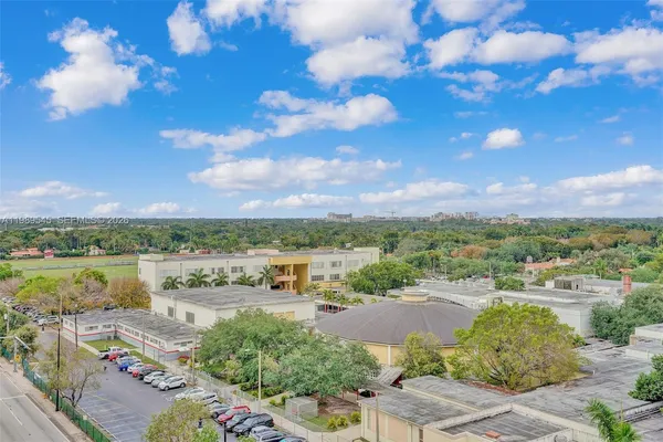 a view of a building with sitting area