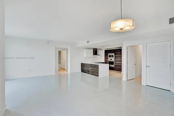 a view of a livingroom and a window