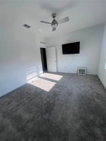 a living room with a flat screen tv