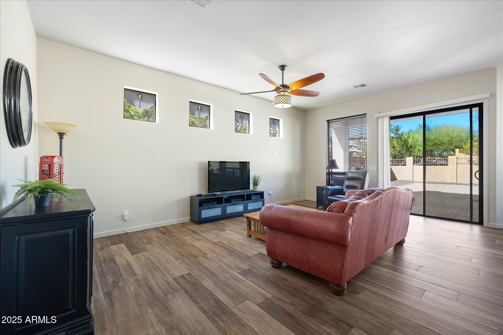 8536 East Inca Street Mesa, AZ 85207 - Photo 14 of 44 a living room with furniture and a flat screen tv