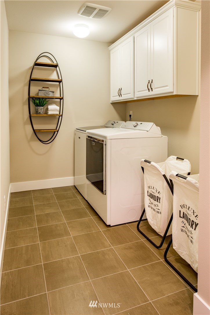 20 215th Street Southeast, Unit 12 Bothell, WA 98021 - Photo 20 of 22 a utility room with dryer and washer