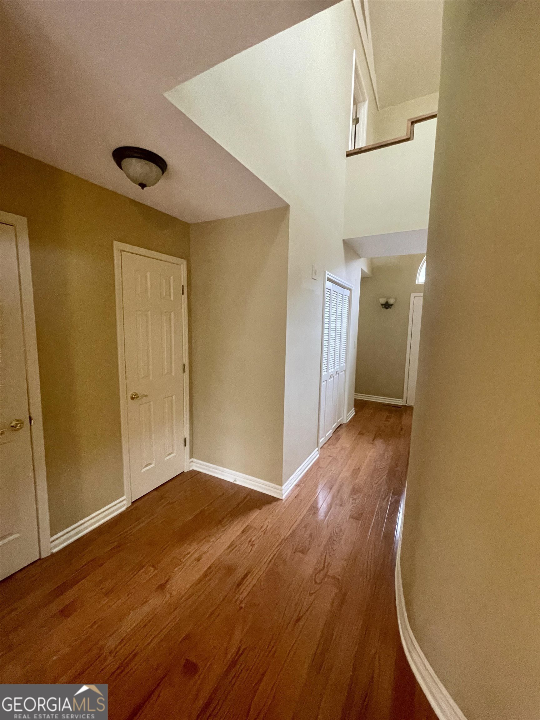 242 Ebenezer Church Road Fayetteville, GA 30215 - Photo 29 of 43 a view of hallway with wooden floor