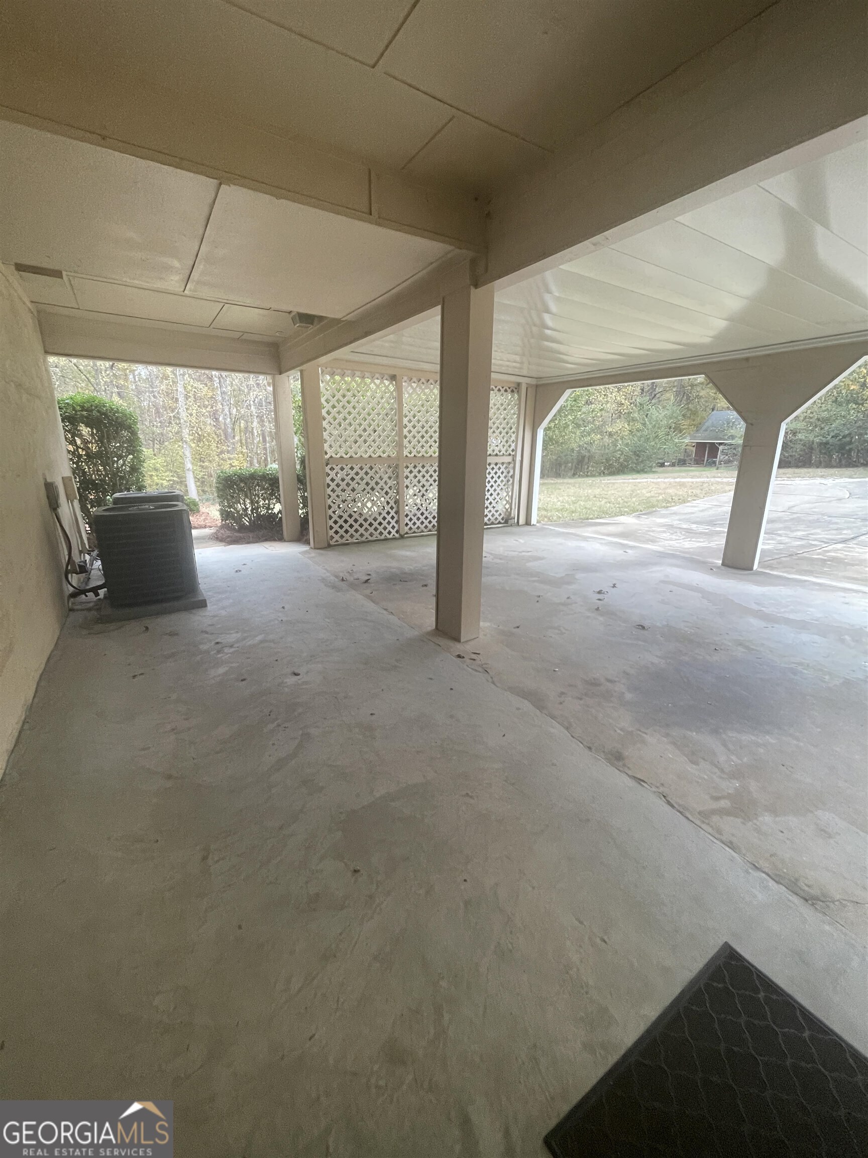 242 Ebenezer Church Road Fayetteville, GA 30215 - Photo 37 of 43 a view of a livingroom with furniture and floor to ceiling window