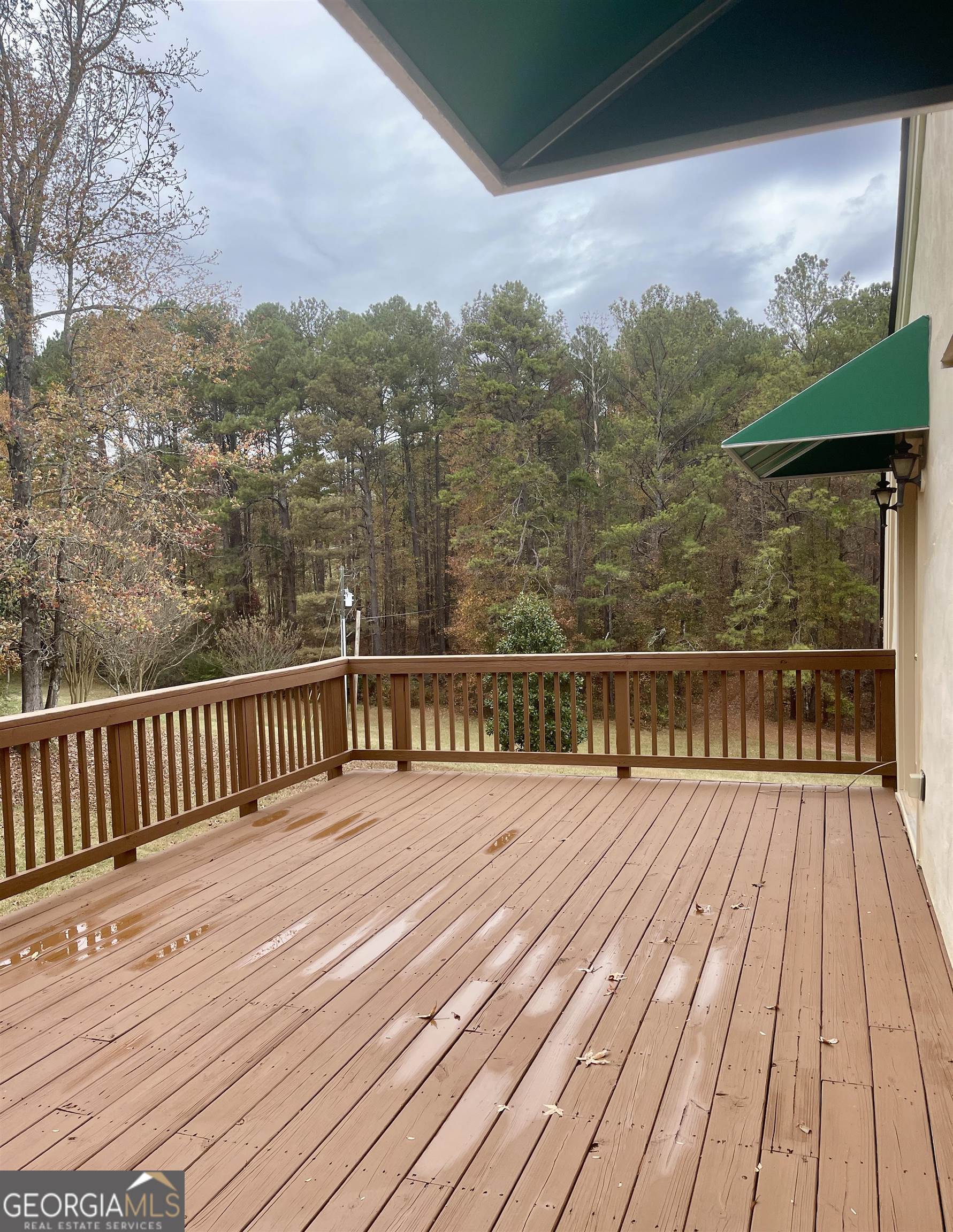 242 Ebenezer Church Road Fayetteville, GA 30215 - Photo 10 of 43 a view of balcony with wooden floor