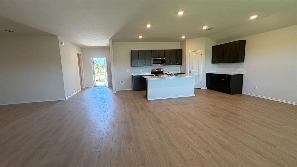 2007 Reveille Way Terrell, TX 75160 - Photo 20 of 31 a view of a living room kitchen and a flat screen tv