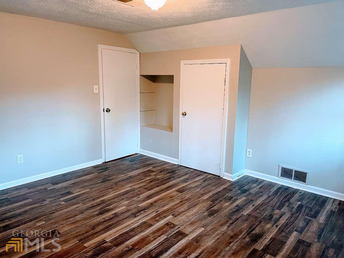 1939 Bonnie Ridge Drive Griffin, GA 30223 - Photo 20 of 23 a view of room with wooden floor