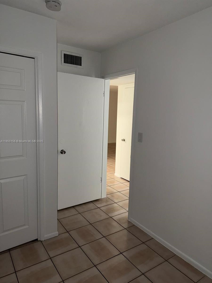 9203 Northwest 38th Drive, Unit 12 Coral Springs, FL 33065 - Photo 11 of 19 a view of an empty room