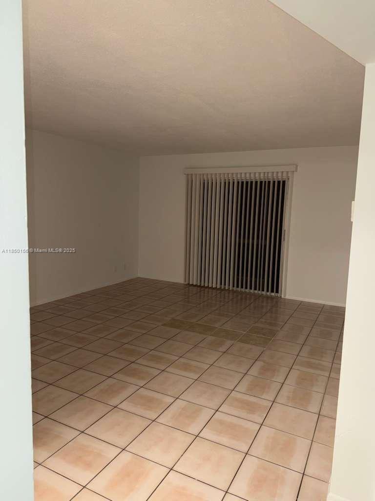 9203 Northwest 38th Drive, Unit 12 Coral Springs, FL 33065 - Photo 14 of 19 a view of empty room