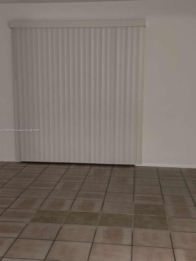 9203 Northwest 38th Drive, Unit 12 Coral Springs, FL 33065 - Photo 18 of 19 a view of a utility room