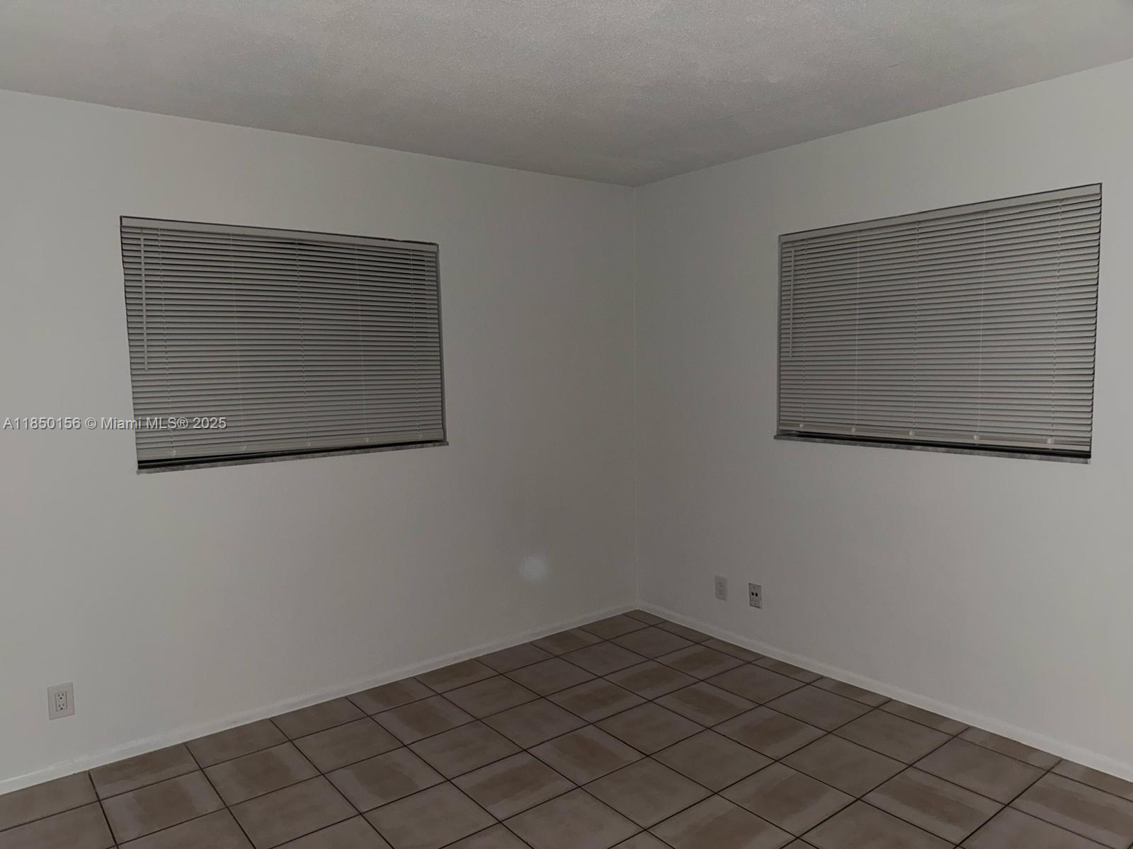 9203 Northwest 38th Drive, Unit 12 Coral Springs, FL 33065 - Photo 3 of 19 a view of empty room