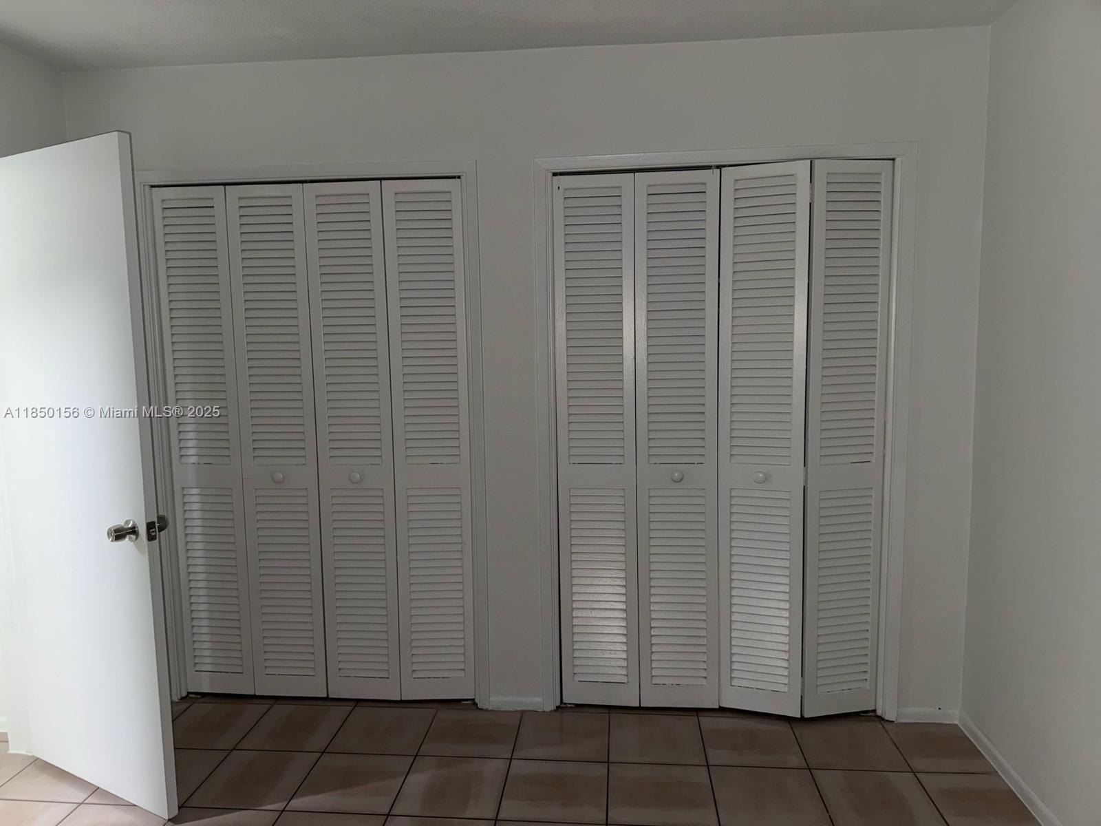 9203 Northwest 38th Drive, Unit 12 Coral Springs, FL 33065 - Photo 5 of 19 a view of a door