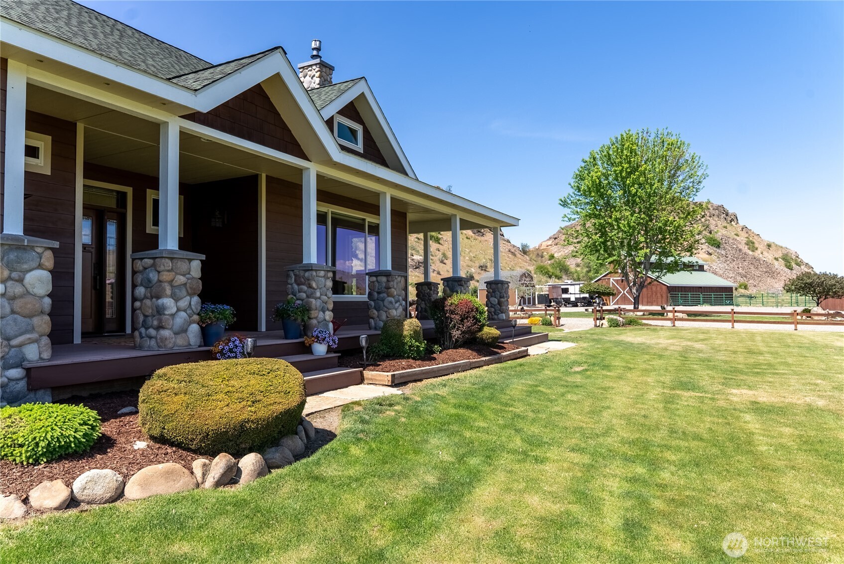 23 George Road Omak, WA 98841 - Photo 8 of 40 a view of a house with backyard outdoor seating area and furniture