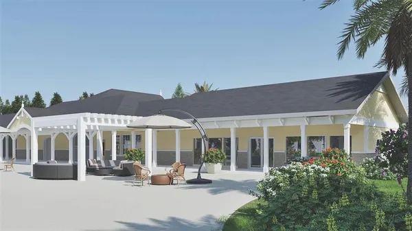 a front view of a residential houses with yard and green space