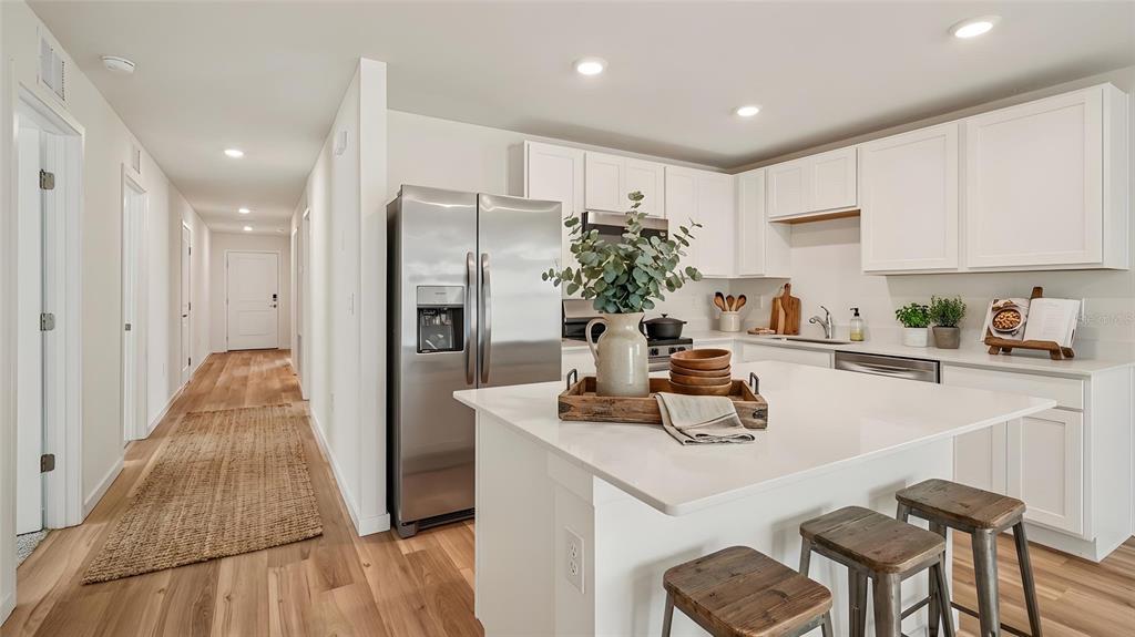 4035 Kona Circle Spring Hill, FL 34608 - Photo 4 of 19 a kitchen with a table and chairs