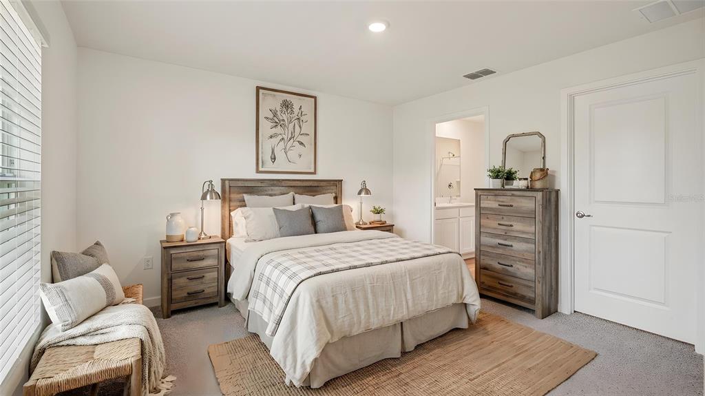 4035 Kona Circle Spring Hill, FL 34608 - Photo 5 of 19 a bedroom with a bed and a dresser