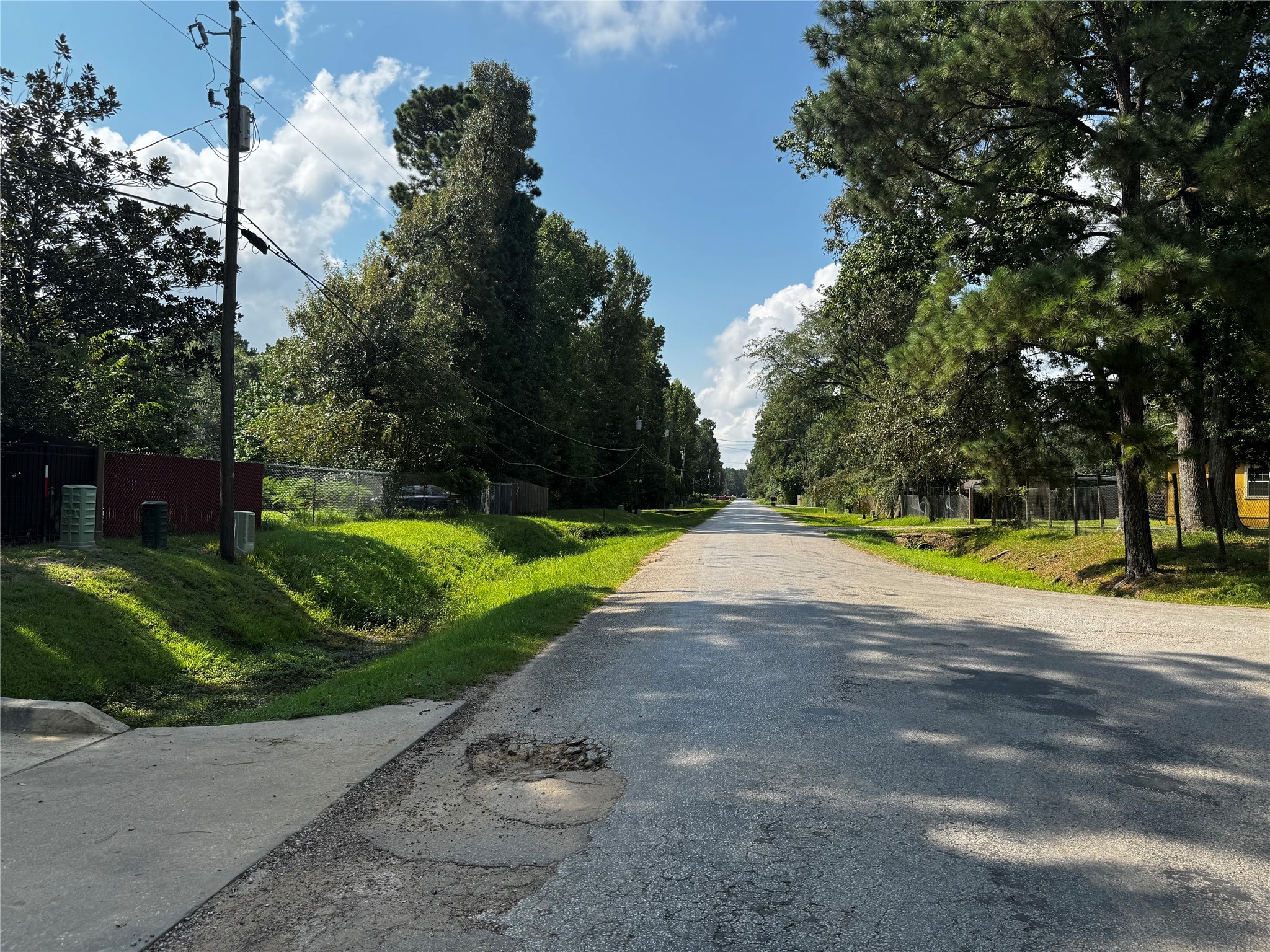 17632 Drowsy Pines Conroe, TX 77306 - Photo 13 of 13 a view of a swimming pool with a yard