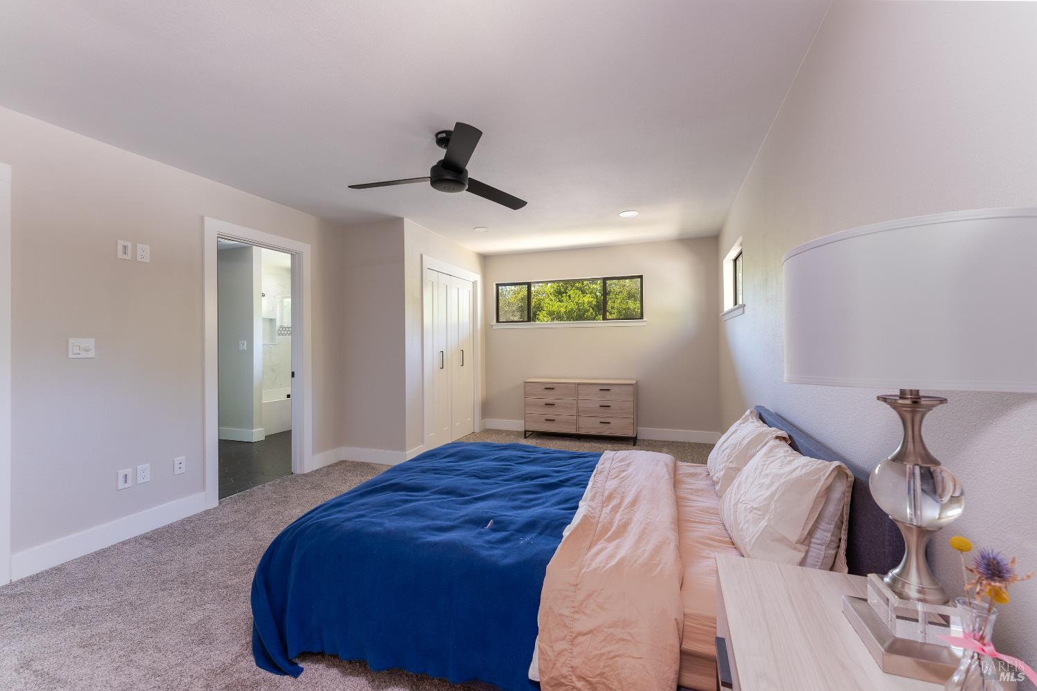 788 Walnut Avenue Ukiah, CA 95482 - Photo 23 of 36 a bedroom with a bed and a window