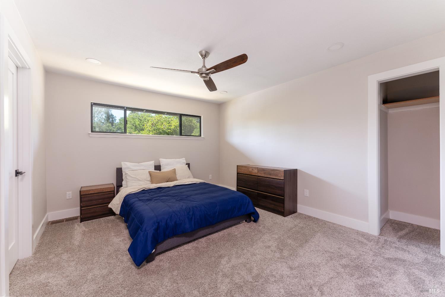 788 Walnut Avenue Ukiah, CA 95482 - Photo 25 of 36 a room with furniture and a ceiling fan
