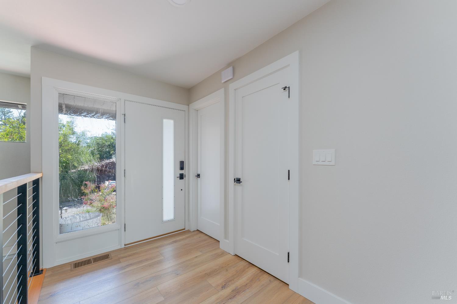788 Walnut Avenue Ukiah, CA 95482 - Photo 29 of 36 a view of an empty room with wooden floor and a window