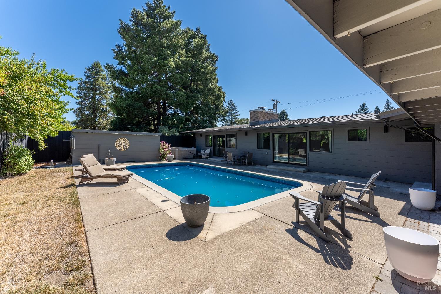 788 Walnut Avenue Ukiah, CA 95482 - Photo 7 of 36 a view of a swimming pool with chairs