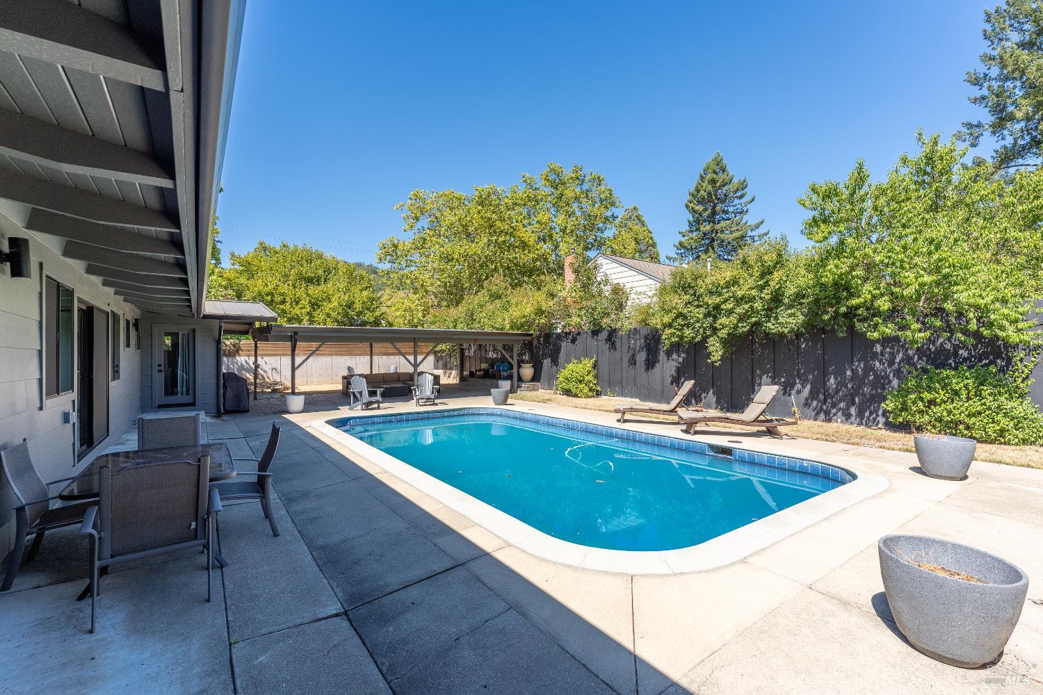 788 Walnut Avenue Ukiah, CA 95482 - Photo 10 of 36 a view of a swimming pool with a patio