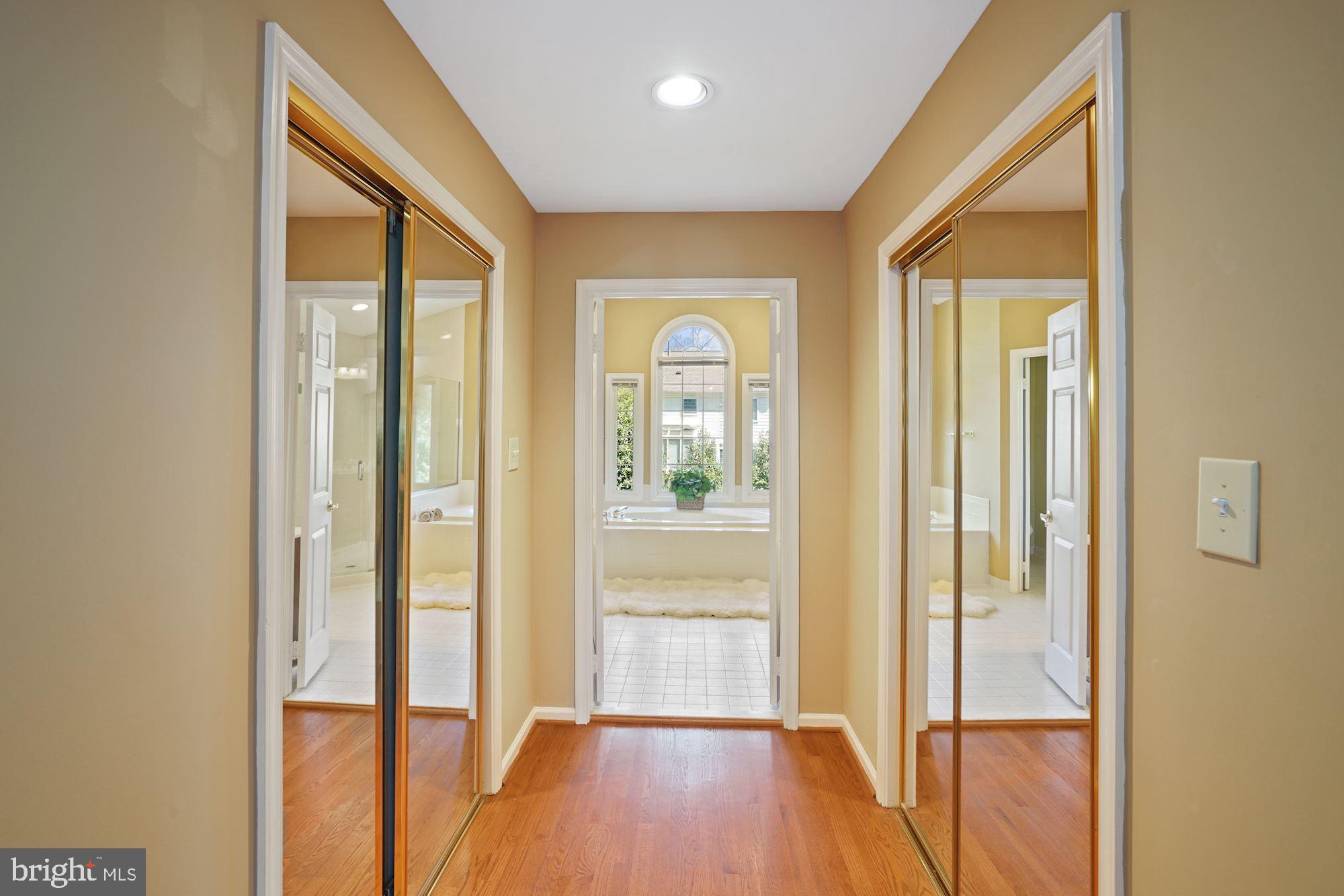 8913 Bells Mill Road Potomac, MD 20854 - Photo 32 of 48 Master Bedroom Walk-In Closets