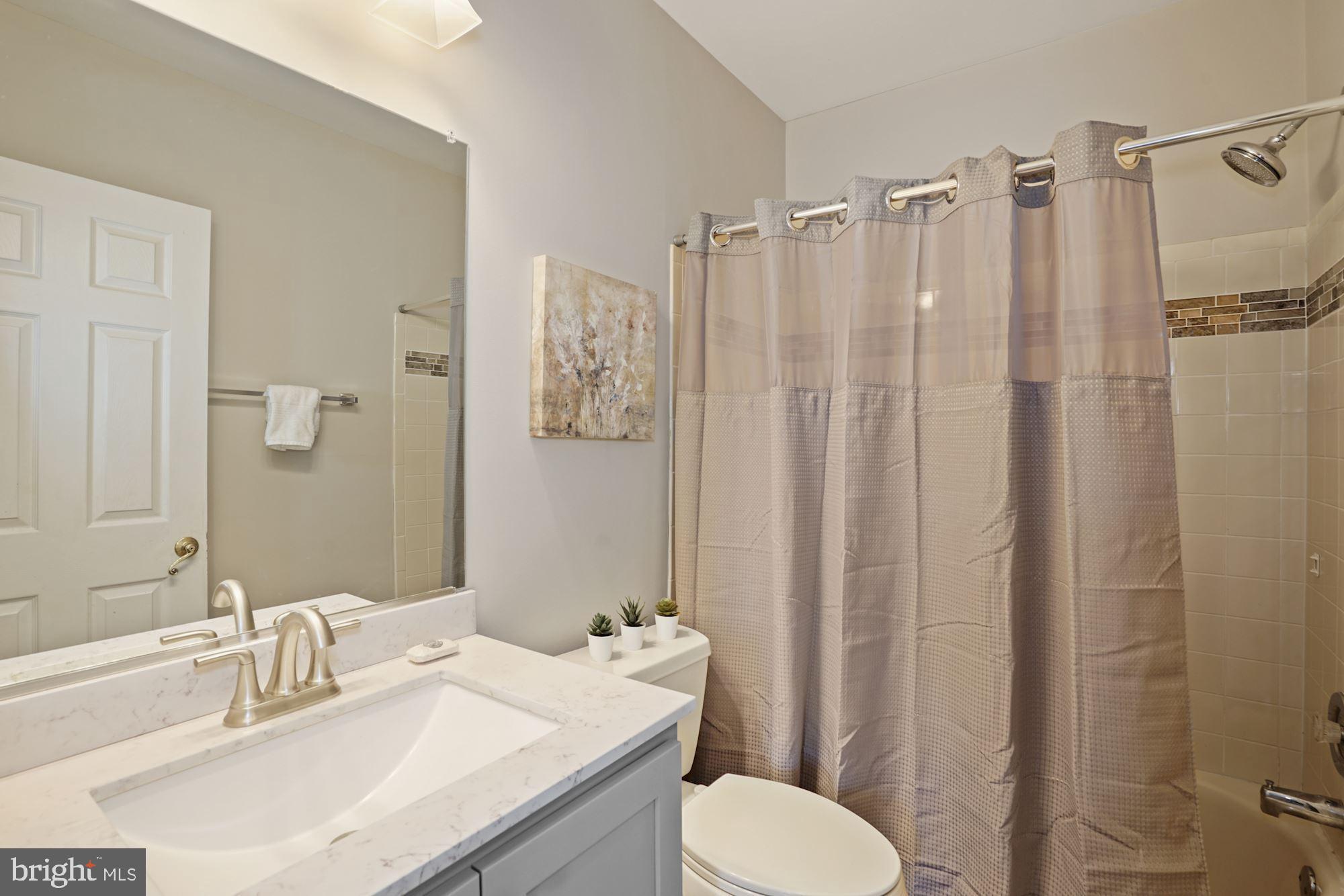 8913 Bells Mill Road Potomac, MD 20854 - Photo 38 of 48 Hallway Bathroom