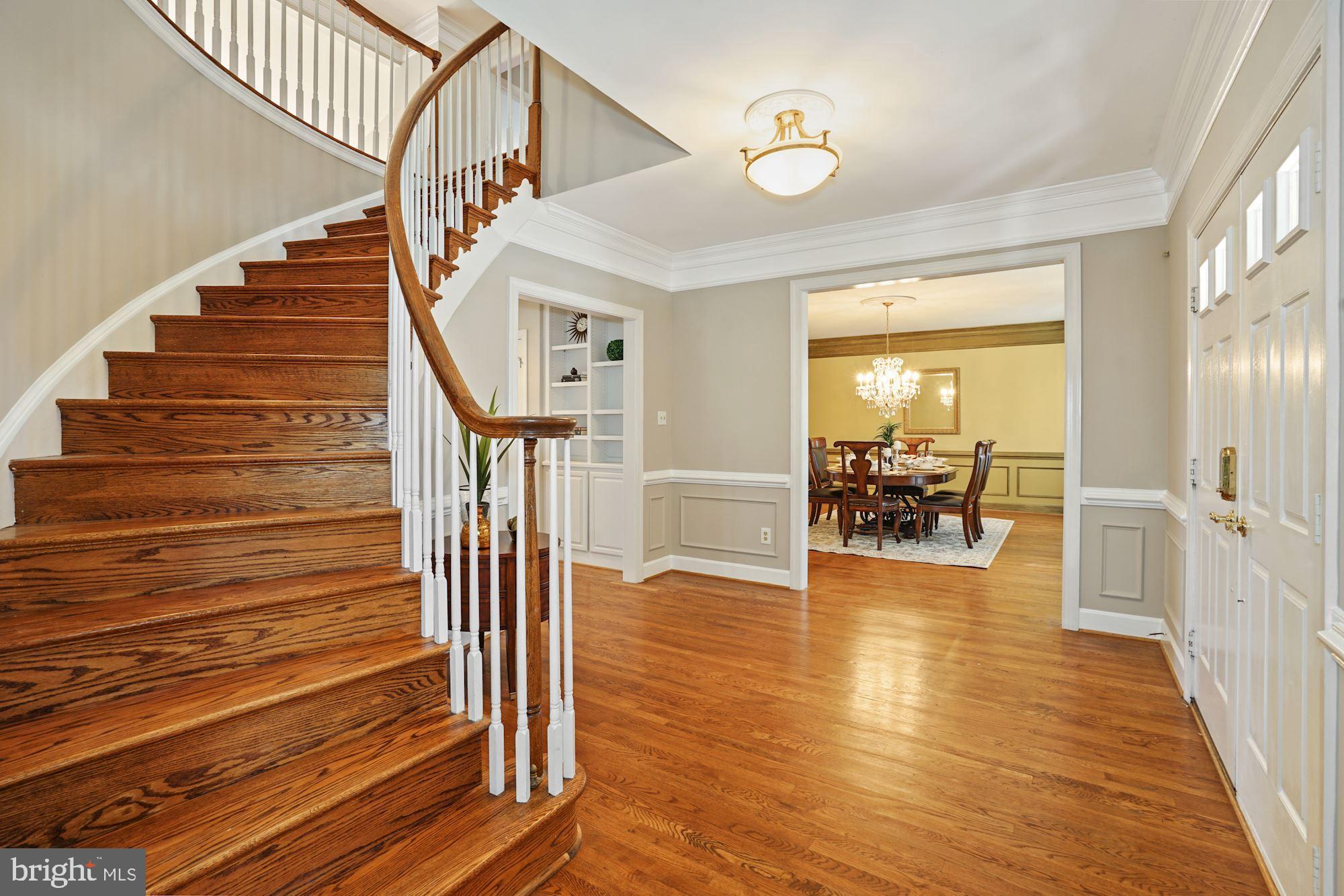 8913 Bells Mill Road Potomac, MD 20854 - Photo 8 of 48 Grand Foyer with Curved Staircase
