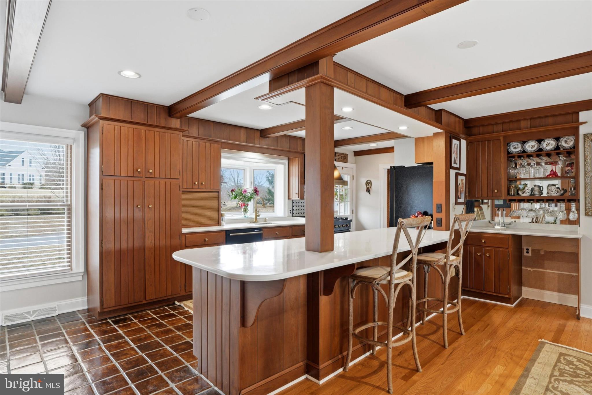 875 Locust Grove Road West Chester, PA 19382 - Photo 11 of 44 a kitchen with stainless steel appliances granite countertop a stove and a refrigerator