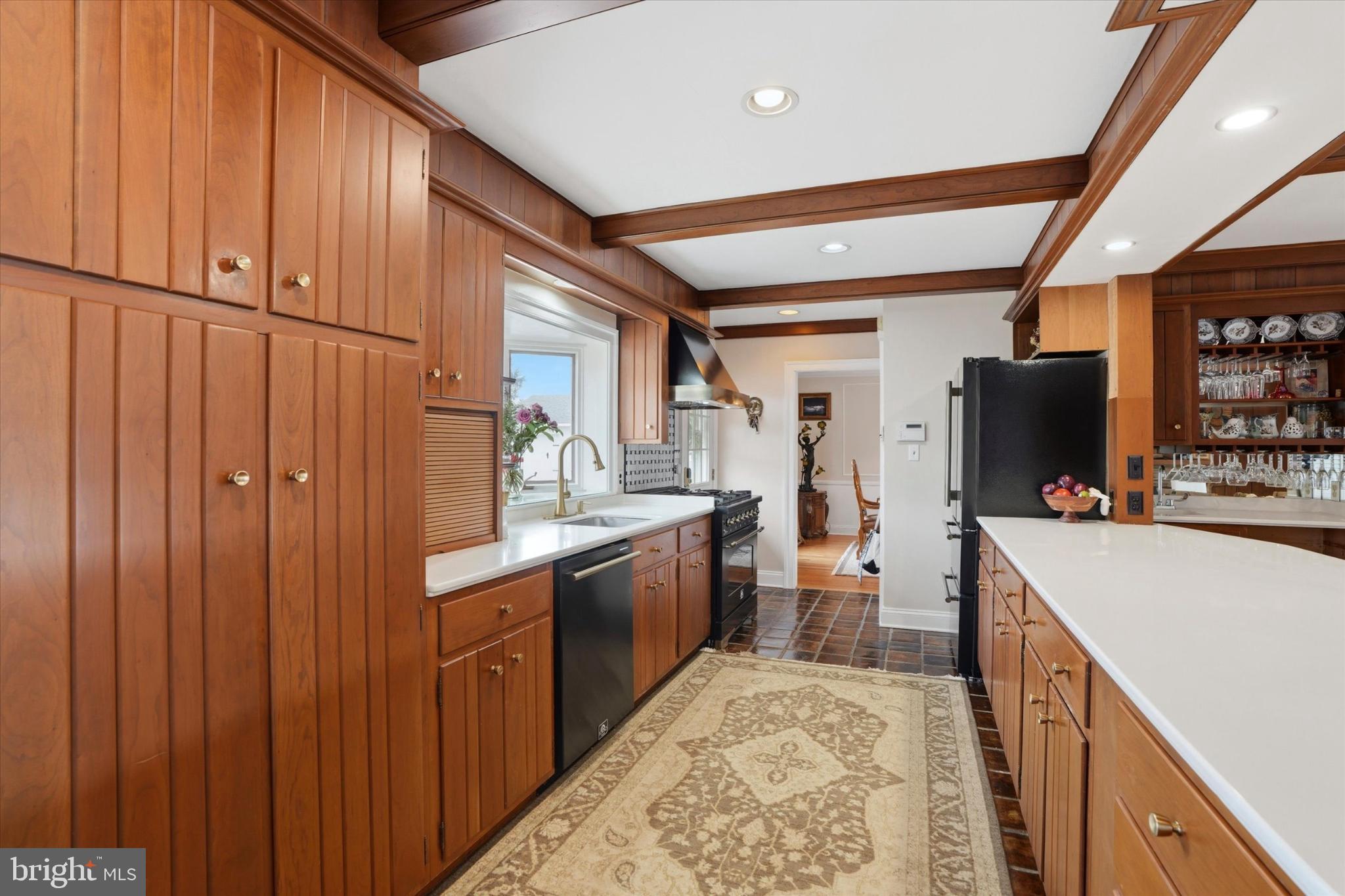 875 Locust Grove Road West Chester, PA 19382 - Photo 12 of 44 a large kitchen with a wooden floor and a sink