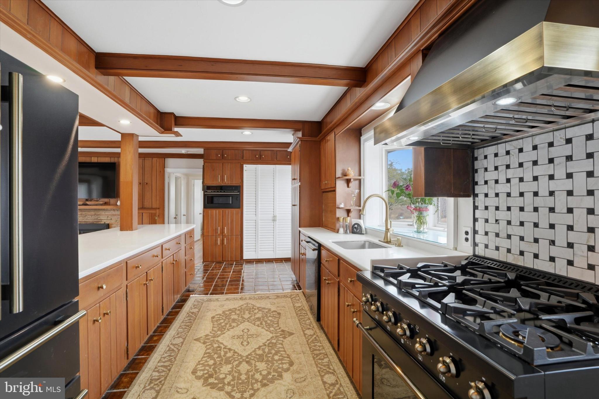875 Locust Grove Road West Chester, PA 19382 - Photo 13 of 44 a kitchen with stove and cabinets