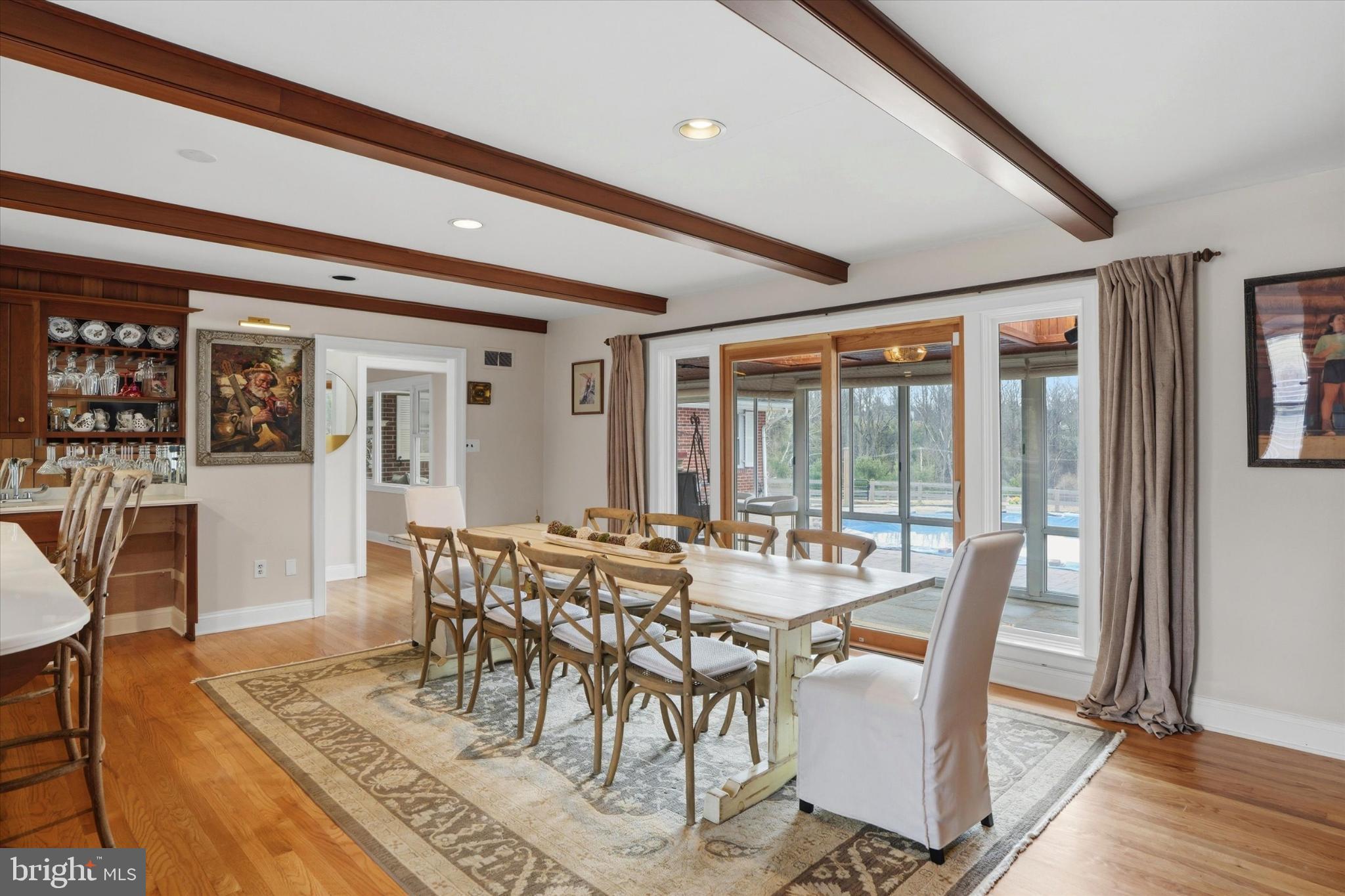 875 Locust Grove Road West Chester, PA 19382 - Photo 15 of 44 a view of a dining room with furniture window and wooden floor