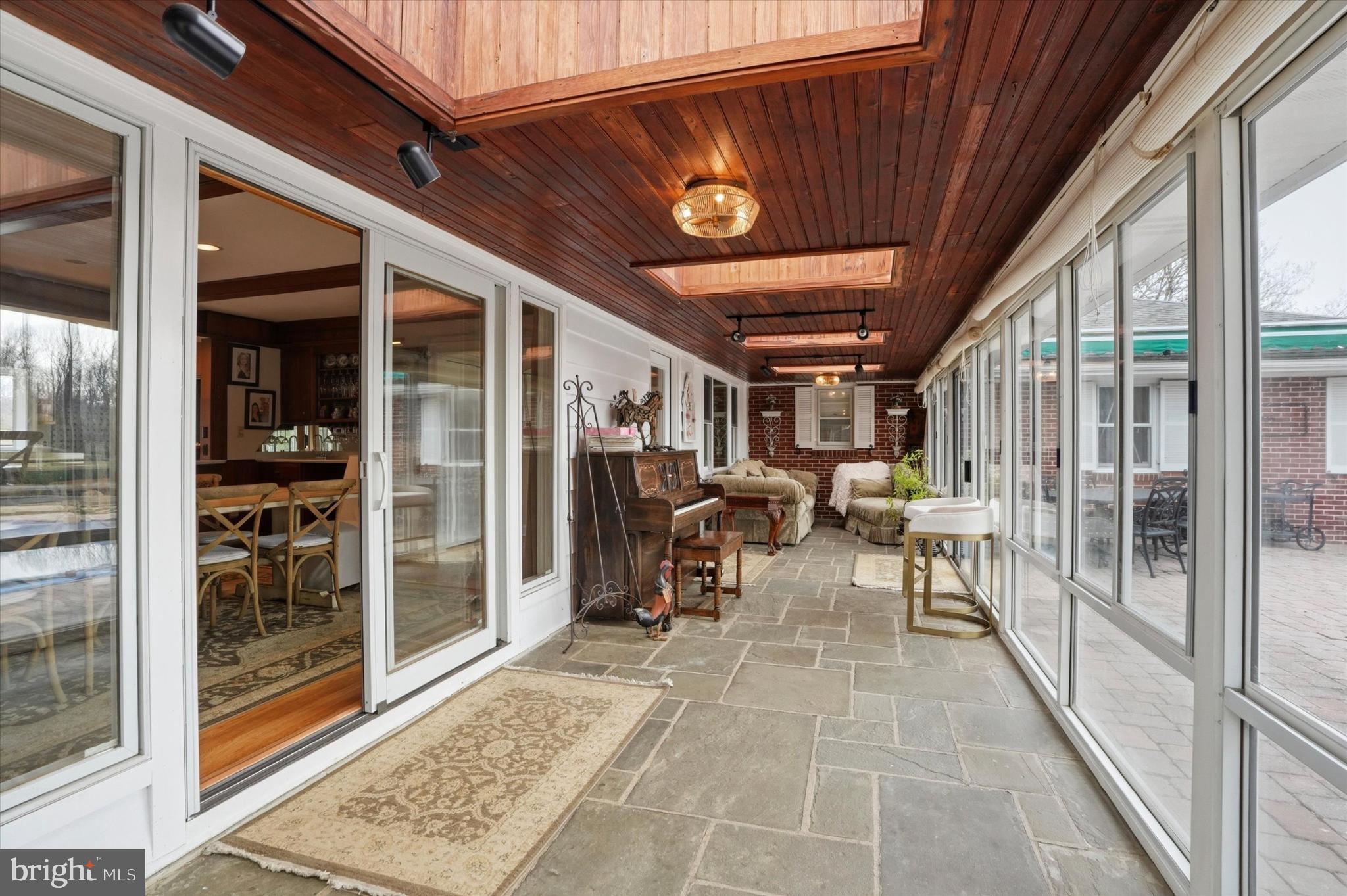 875 Locust Grove Road West Chester, PA 19382 - Photo 17 of 44 a view of a porch with chairs